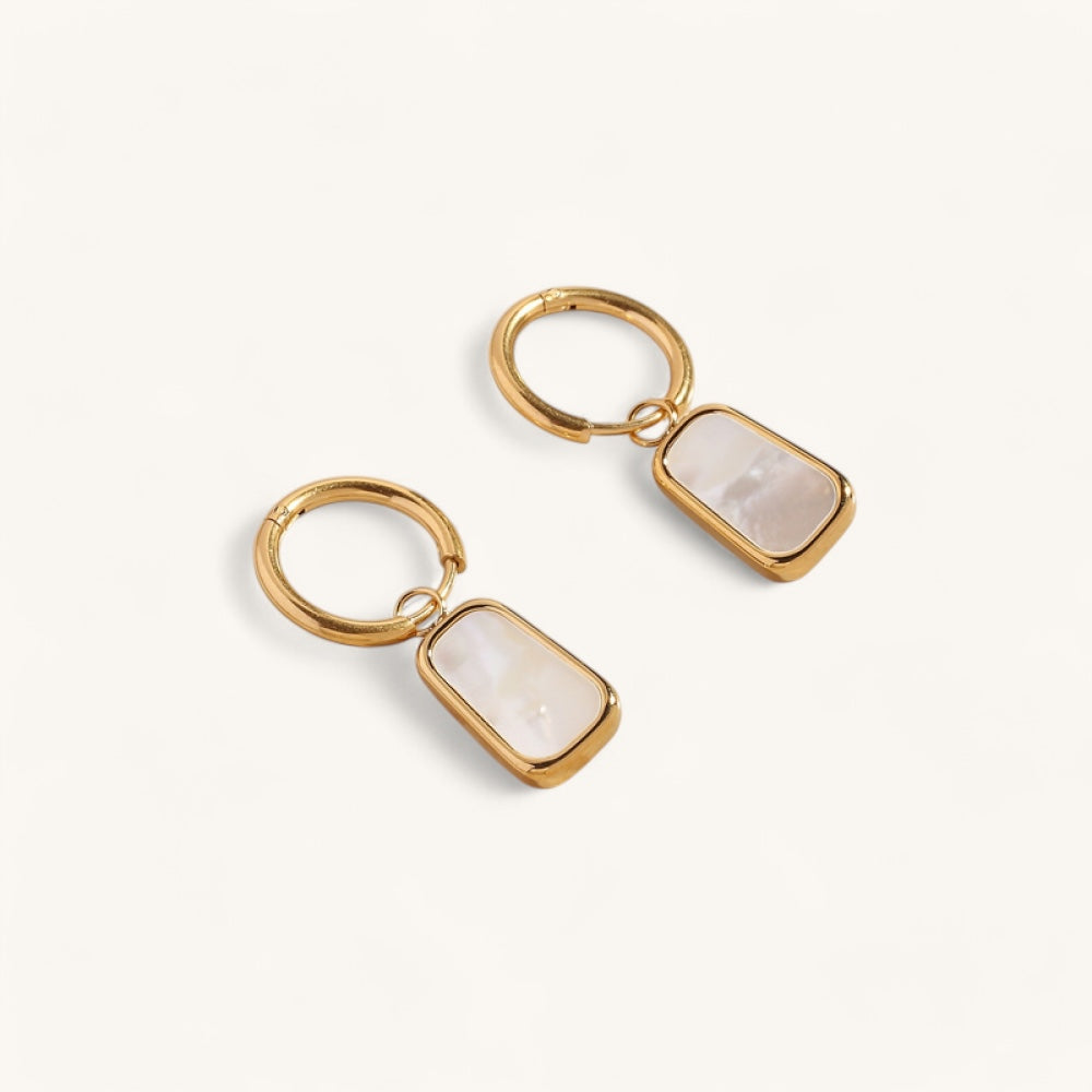 The pearl pendant earrings